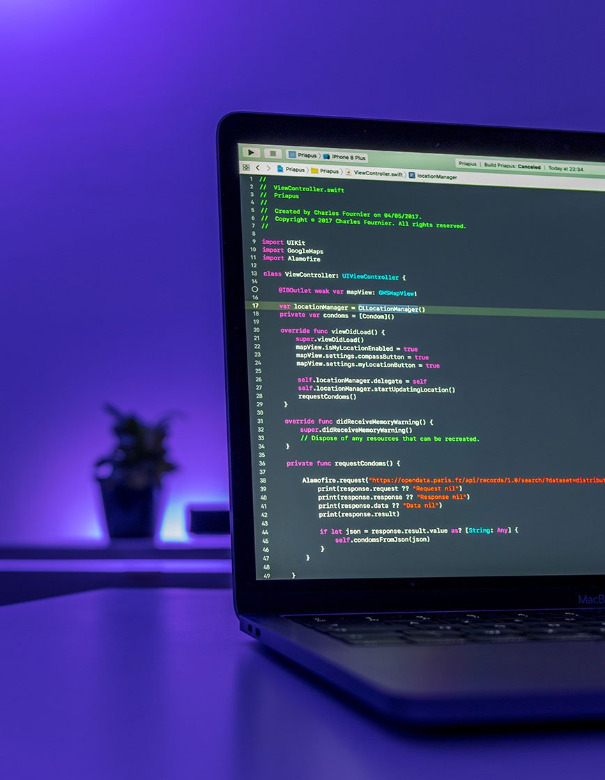 Laptop with Coding on Screen